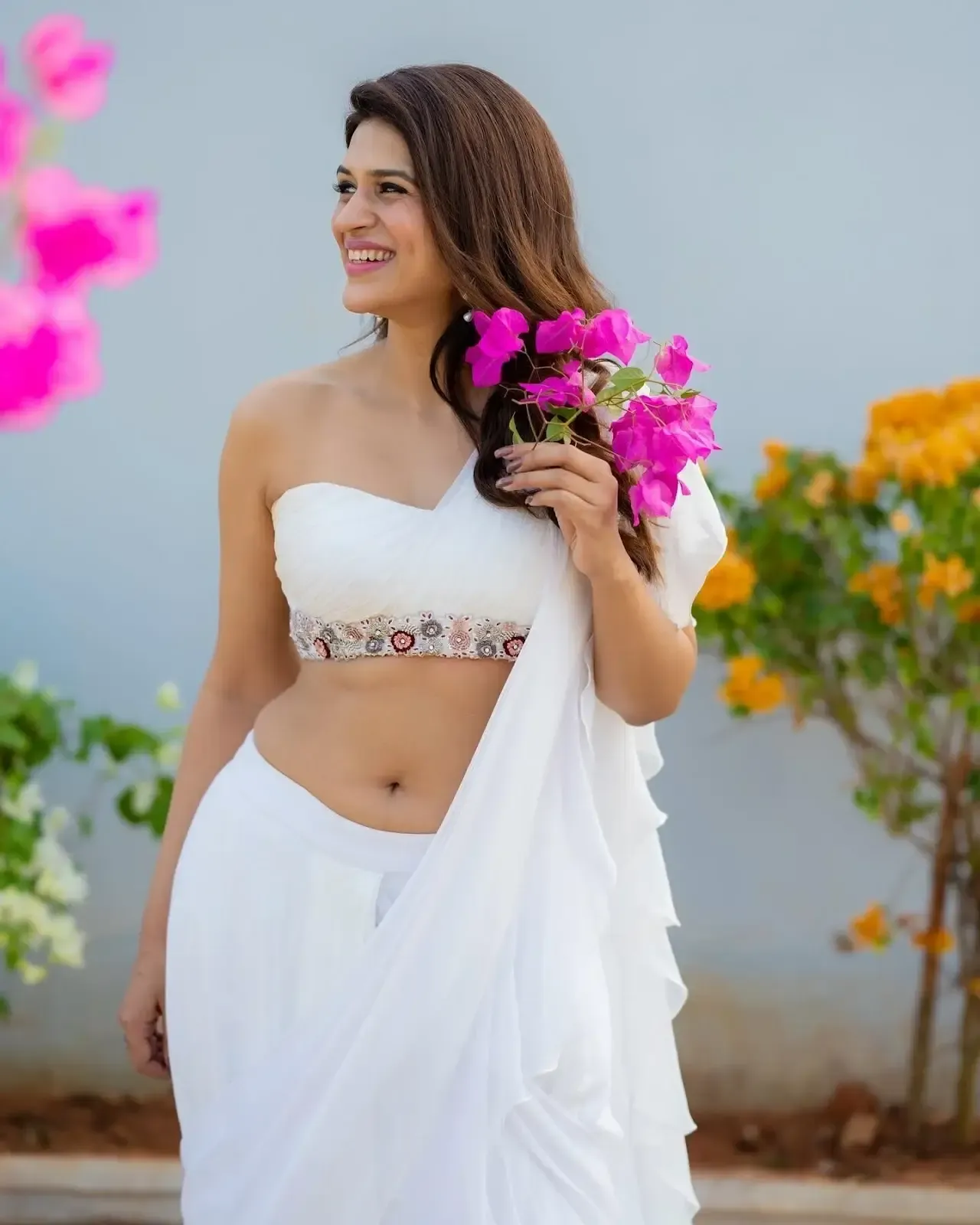 South Indian TV Model Shraddha Das in White Lehenga Choli